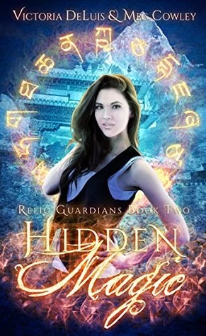 Hidden Magic (Relic Guardians #2) by Meg Cowley, Victoria DeLuis