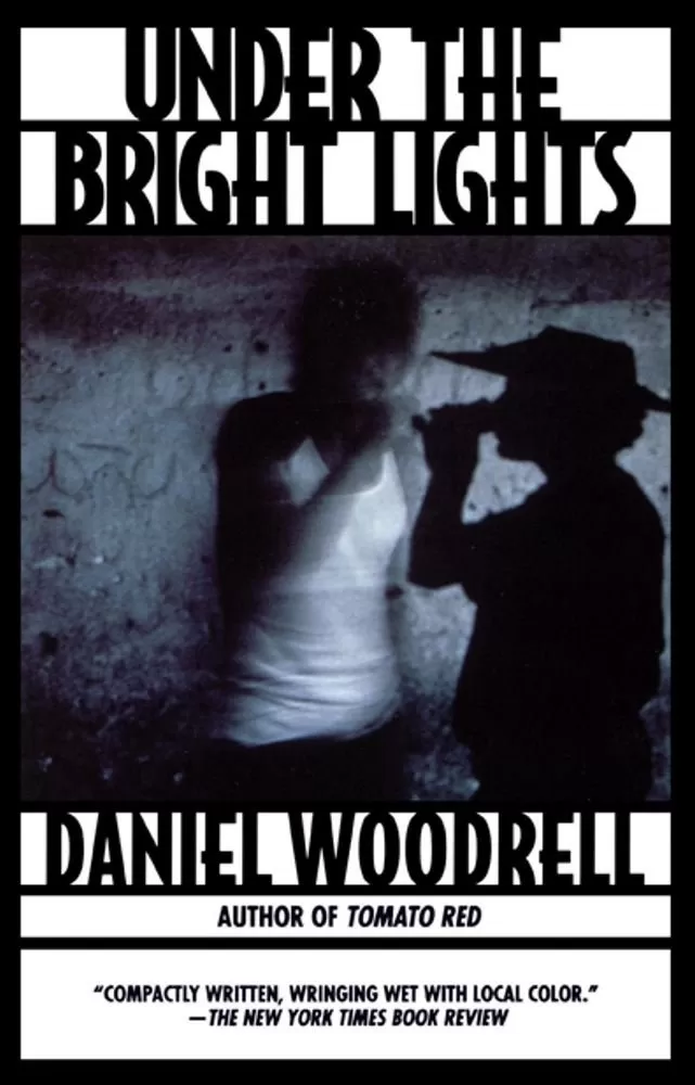 Under the Bright Lights (Rene Shade #1) by Daniel Woodrell